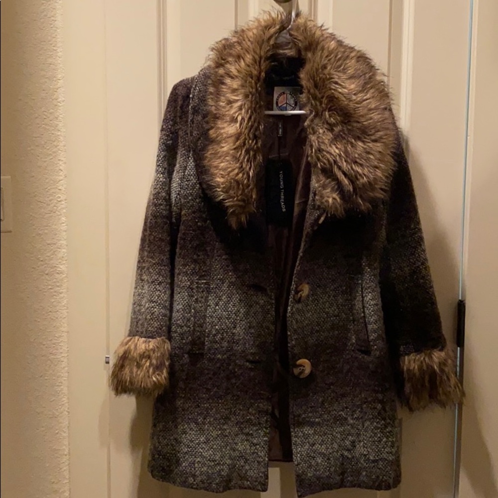 New coat from cross cultures in Fredericksburg Tx